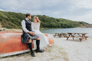 Happy international couple celebrating their destination wedding on Bornholm island in Denmark
